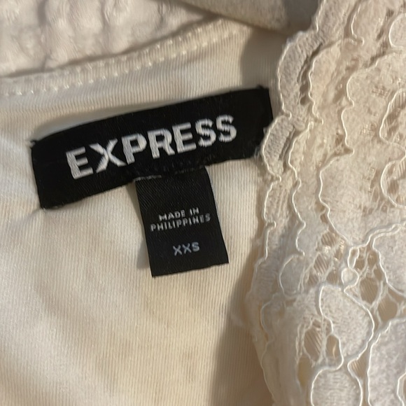 Express- white lace faux wrap jumpsuit w/pockets - Picture 8 of 14